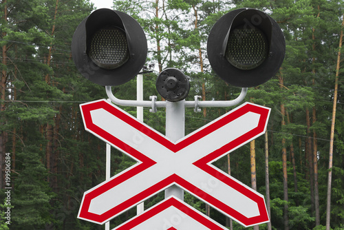 Railway semaphore in the forest photo