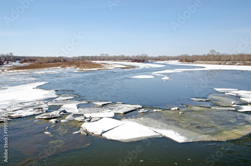 the river wakes up after winter. ice melts and opens the water surface. Russia. 