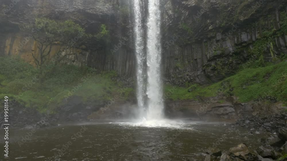 Tilt up view of a waterfall