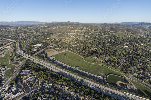 Aerial view of homes  parks and Route 23 Freeway near Los Angeles in suburban Thousand Oaks  California.  