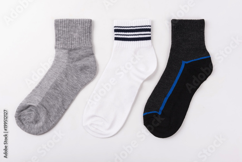 Grey ,white ,blue socks isolated on white background.