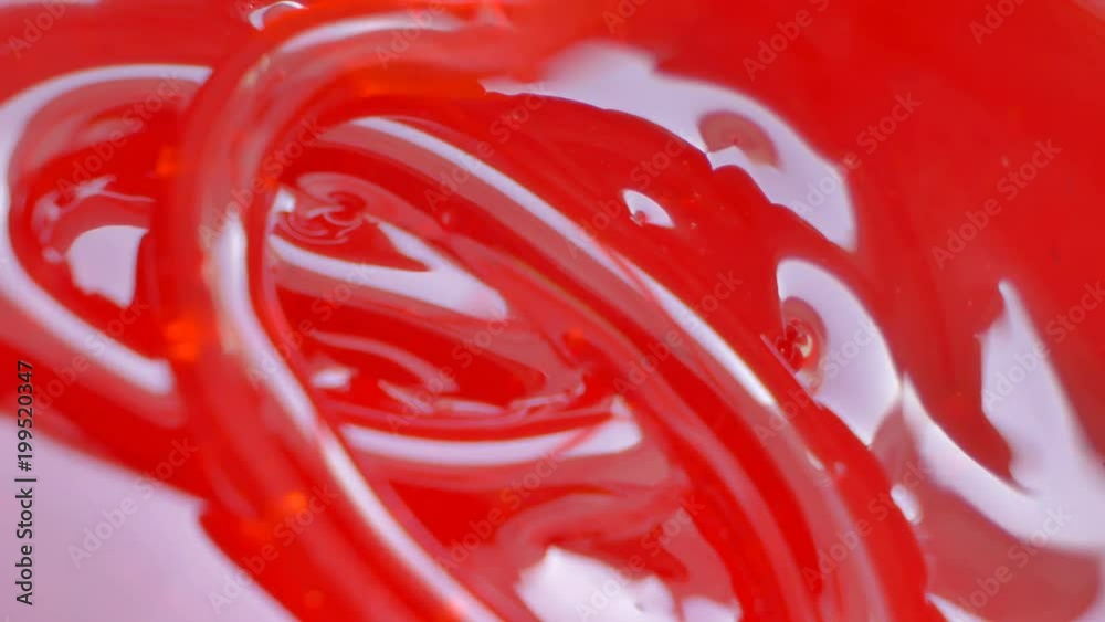 Strawberry red syrup for sweet delicacy. Preparation of caramel. Tough pattern Strawberry red syrup for sweet delicacy. Preparation of caramel. Tough pattern
