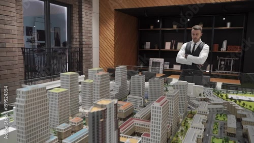 Master-builder is watching a layout