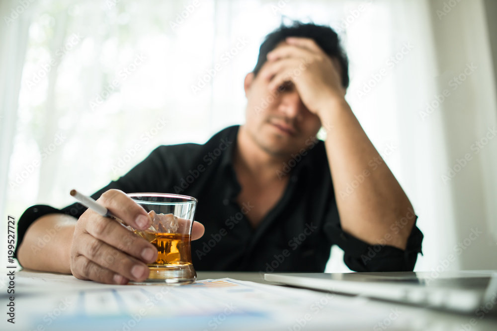 Young business people are suffering from headaches Young business people are suffering from headaches