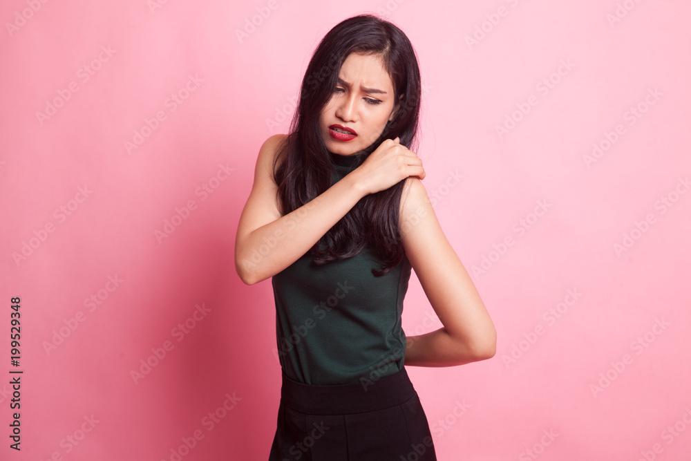 Young Asian woman got back pain. Young Asian woman got back pain.