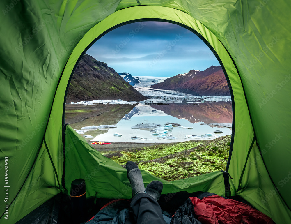 Camping at glacier with cold lake in Iceland