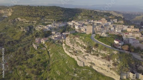 Castello con torre medievale in Italia, costruito per avvistamento e difesa della popolazione dalle invasioni saracene. Vista aerea. photo