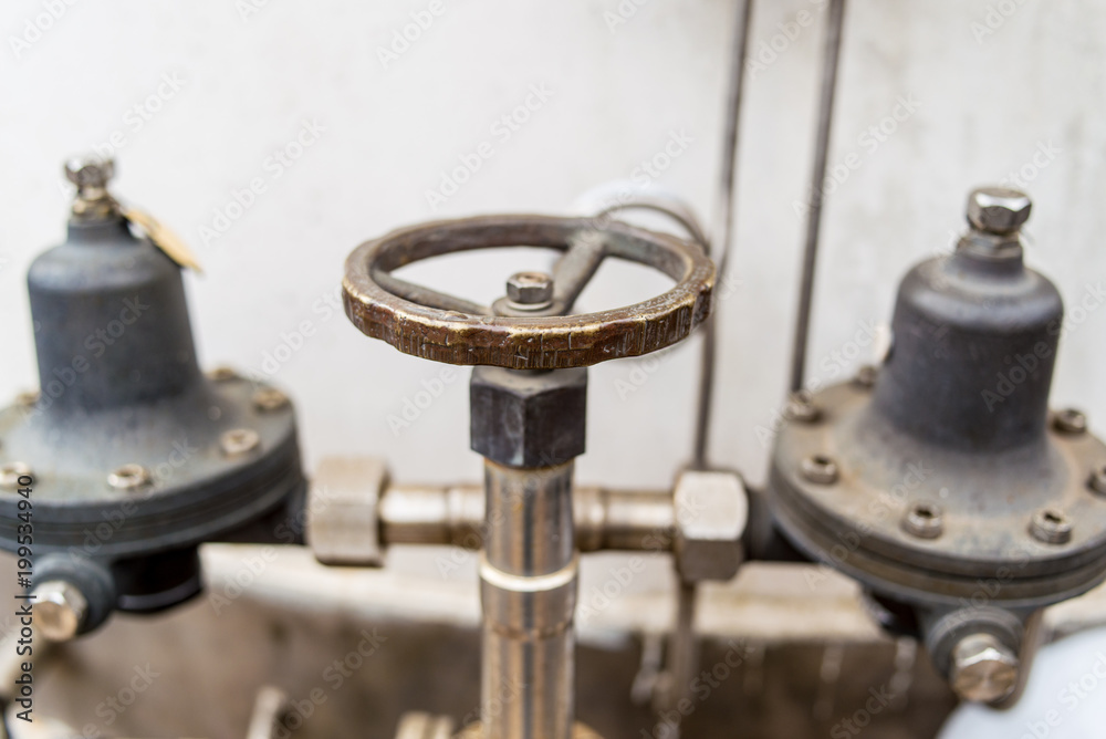 Manual valve installed in industrial piping Manual valve installed in industrial piping