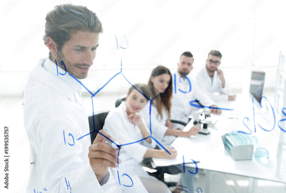 view through the transparent Board. a scientist makes a report. view through the transparent Board. a scientist makes a report.