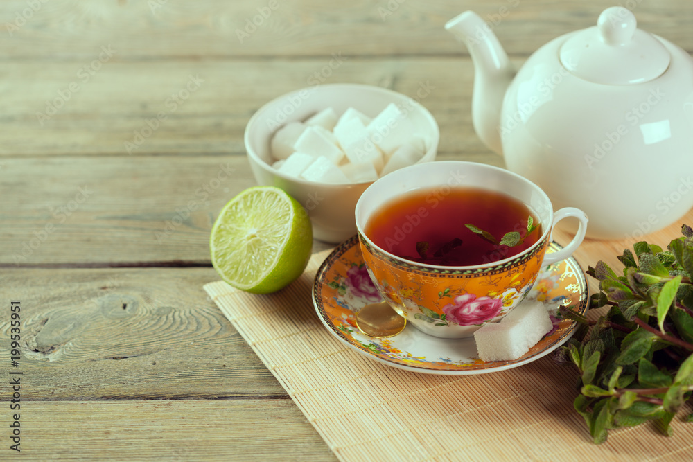 Cup of tea on wooden table Cup of tea on wooden table