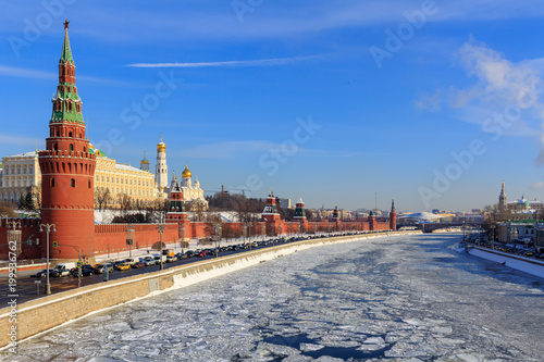 Frozen Moskva river on the background of Kremlevskaya embankment. Winter in Moscow