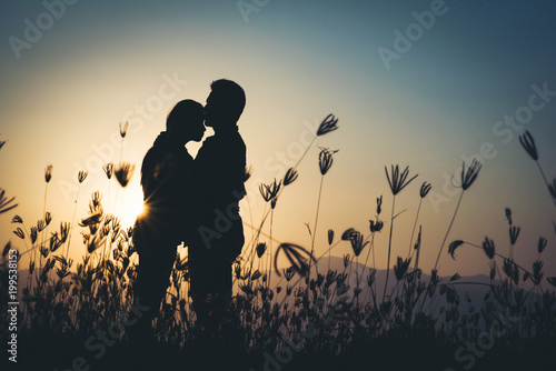 silhouette of Couple in love silhouette during sunset