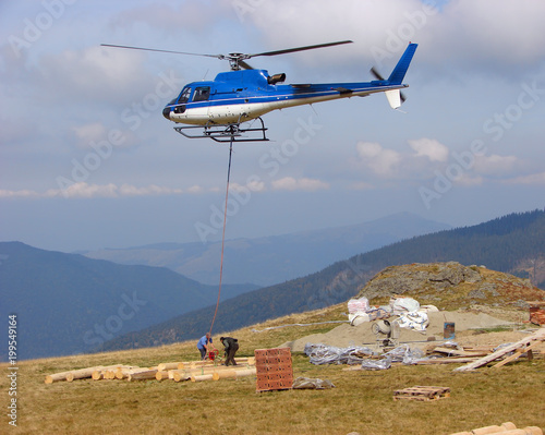Helicopter is ready transport wood beams
