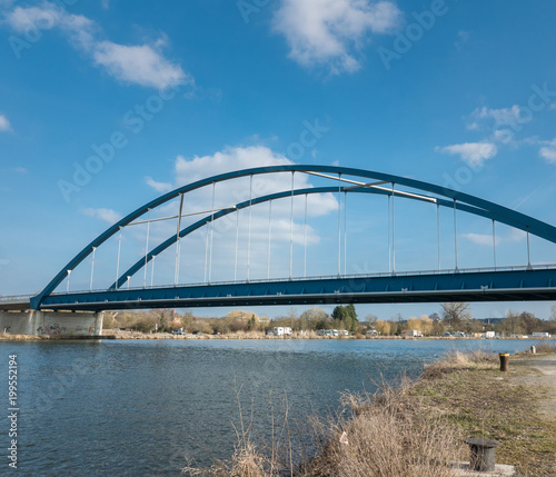 Large blue bridge in front of blue sky at the harbor © Ingo Menhard