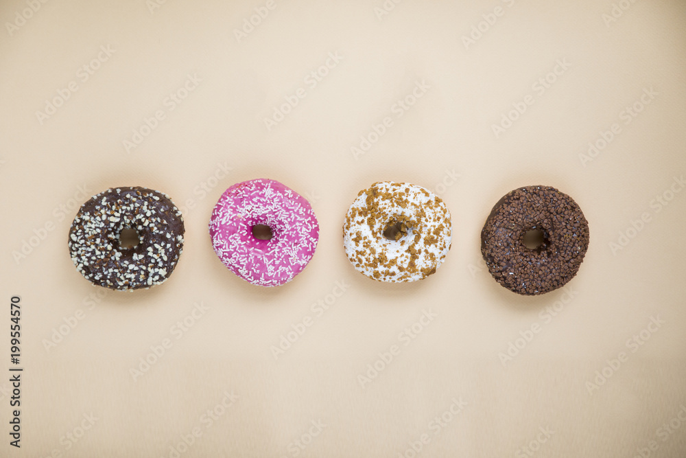 donuts on yellow background donuts on yellow background