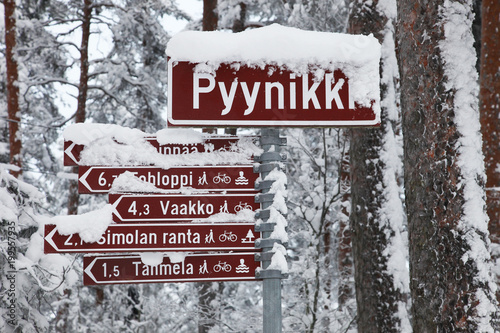 Snow-covered road signs in Tampere