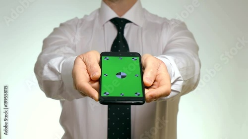 Man White Shirt Black Tie Showing Information Concept Smartphone Green Screen