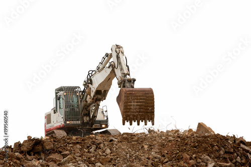 excavator with bucket on gravels white background