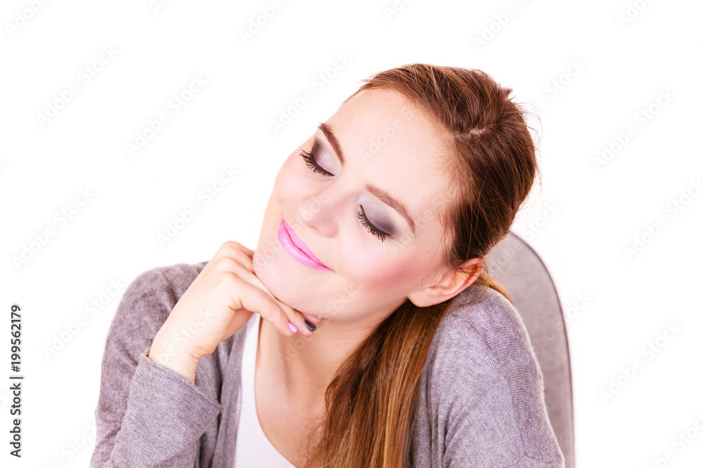 Woman sitting at desk in office and dreaming Woman sitting at desk in office and dreaming
