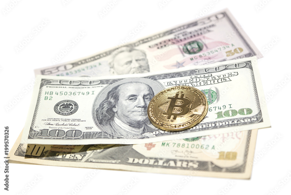 Golden bitcoin coin on us dollars close up. Golden bitcoin coin on us dollars close up.