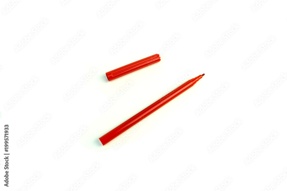 the red marker. photo on white background. the red marker. photo on white background.