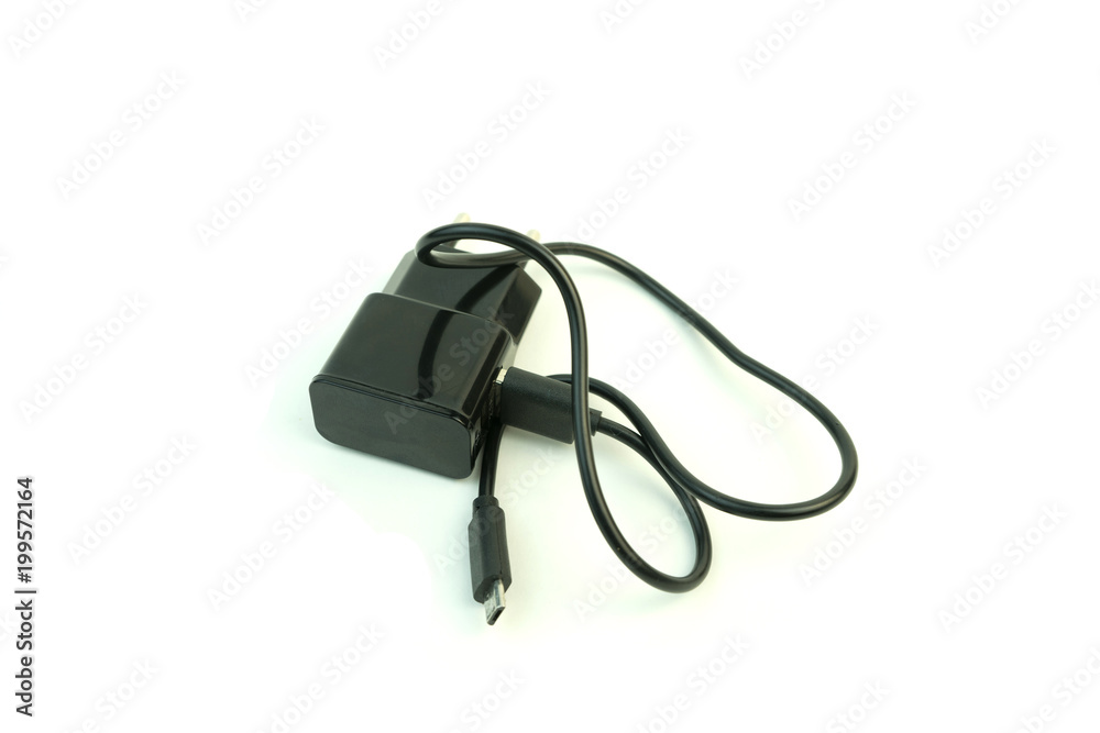 The charger for the phone. Photo on white background. The charger for the phone. Photo on white background.