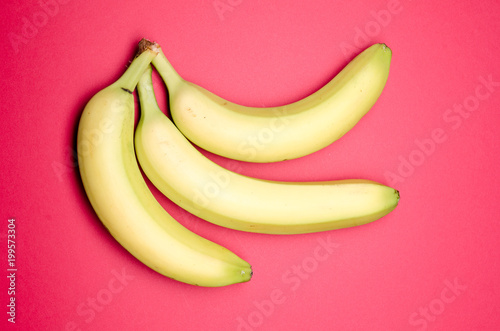 banana ripe on a red background