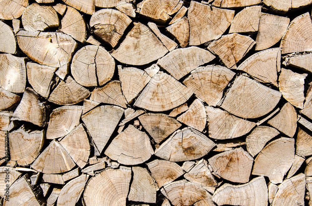 Firewood texture, Stack of wood, Pile of wood cut for fireplace, Wooden natural background, Pattern out of wood, Rough wooden floor, Background cut wood Firewood texture, Stack of wood, Pile of wood cut for fireplace, Wooden natural background, Pattern out of wood, Rough wooden floor, Background cut wood