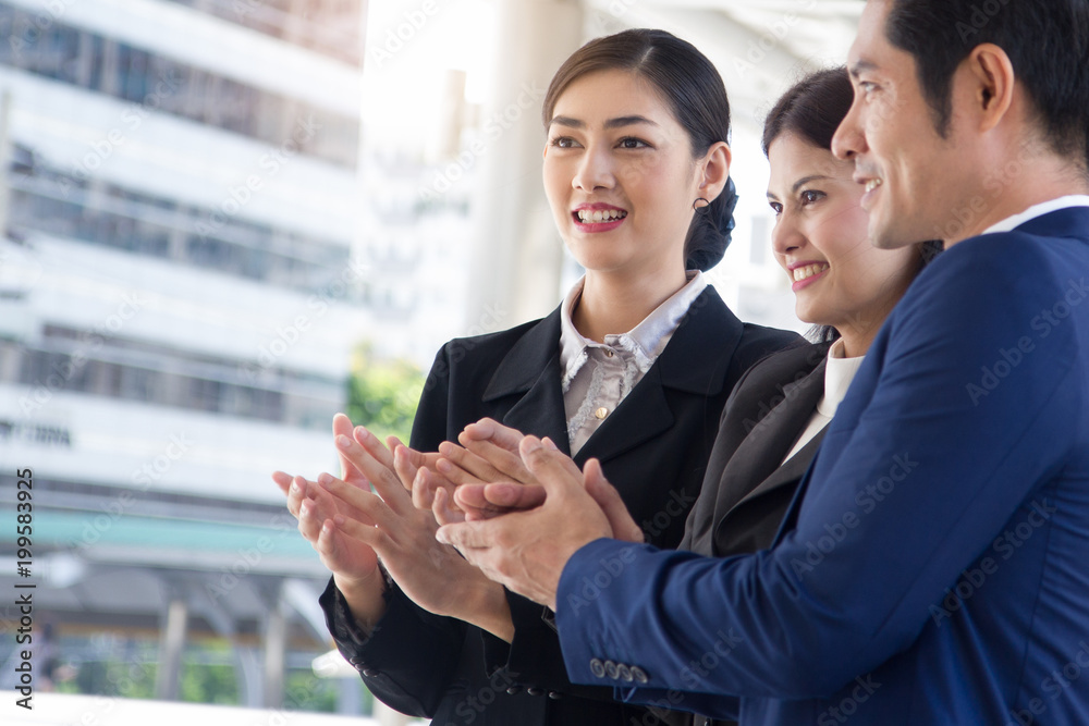 Group of asian businesspeople clapping hands congratulation. Group of asian businesspeople clapping hands congratulation.