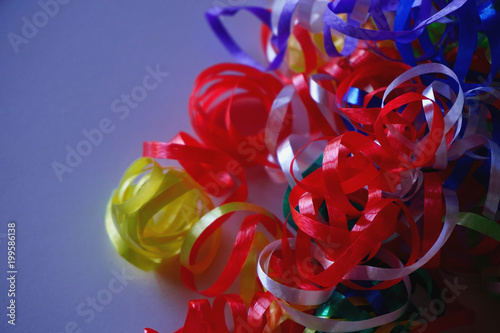 Tinsel, stripes isolated. Colorful ribbons, decorations for holiday.  © Olga