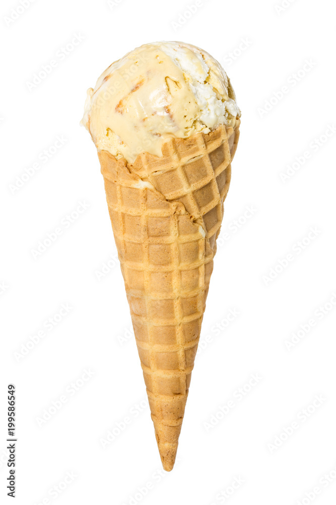 Vanilla ice cream in waffle cone isolated on white Vanilla ice cream in waffle cone isolated on white