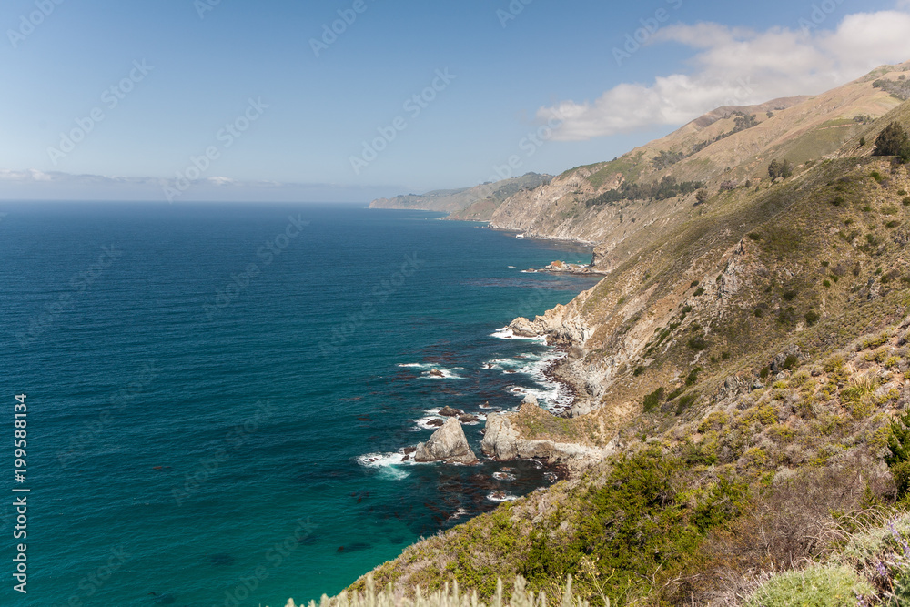 View of Hills, Mountains and the Rocky Shore of Big Sur National Park, California View of Hills, Mountains and the Rocky Shore of Big Sur National Park, California