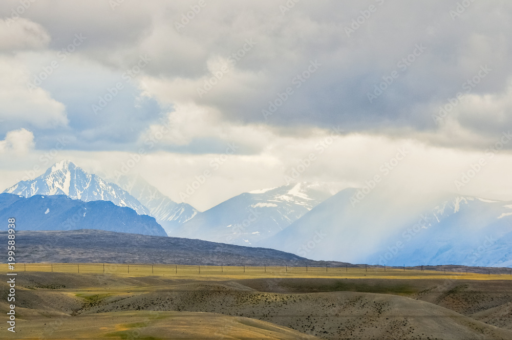 Altai mountains landscape. Rainy, foggy mountain peaks