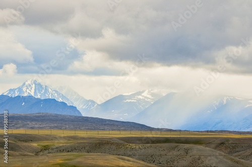 Altai mountains landscape. Rainy, foggy mountain peaks