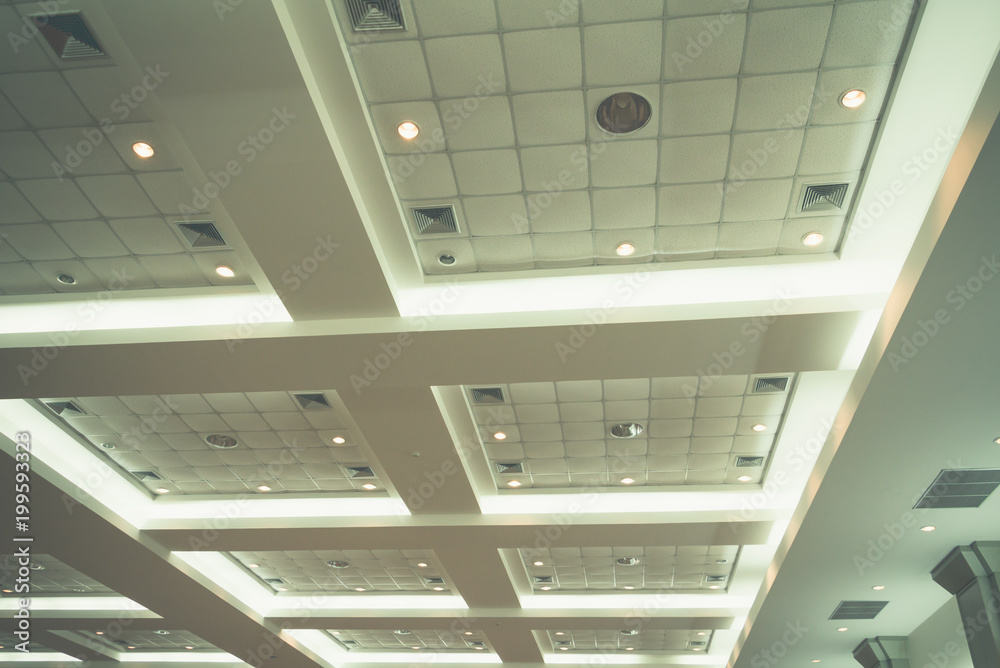 ceiling of business interior office building and light neon. vintage style tone with copy space add text ceiling of business interior office building and light neon. vintage style tone with copy space add text