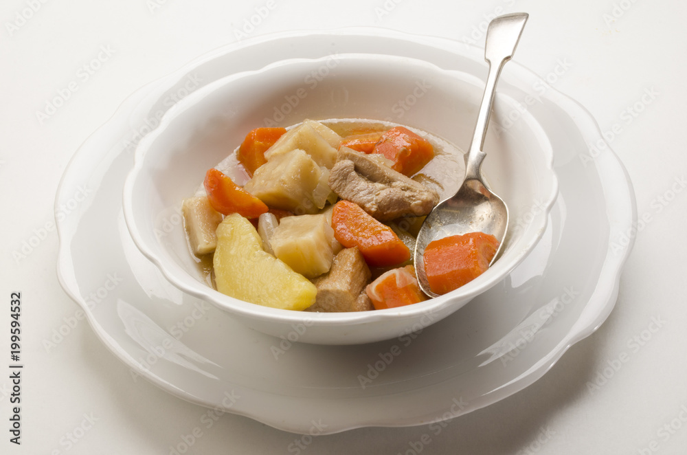 delicious home made irish stew in a white bowl