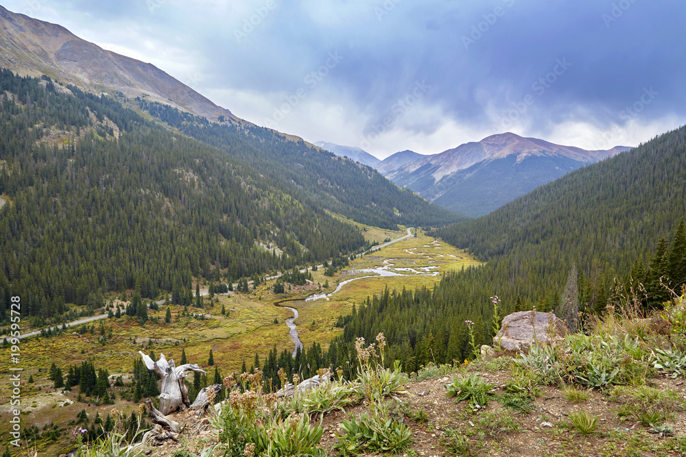 Mountains with stream and road looking over the Continental Divide