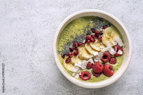 Smoothie in bowl with healthy additives photo