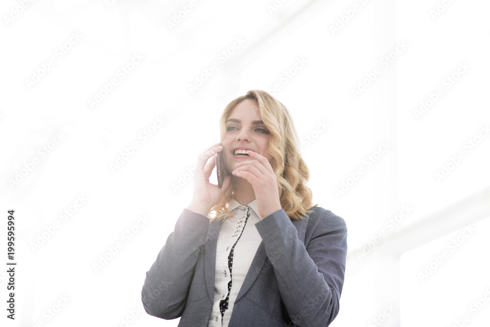successful business woman talking on the phone. successful business woman talking on the phone.