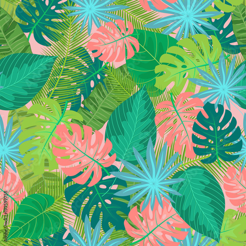 Green tropical leaves pattern for summer background or texture