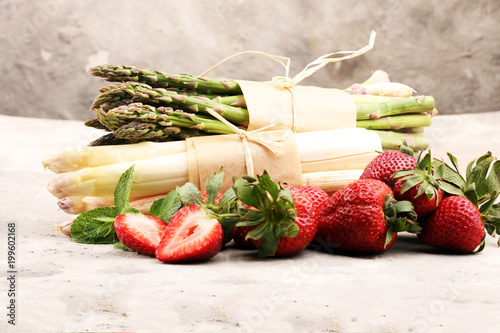 White and green asparagus with strawberries