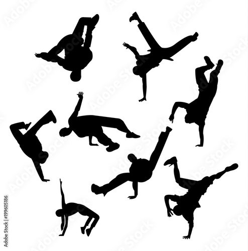 Black silhouettes of breakdance figures