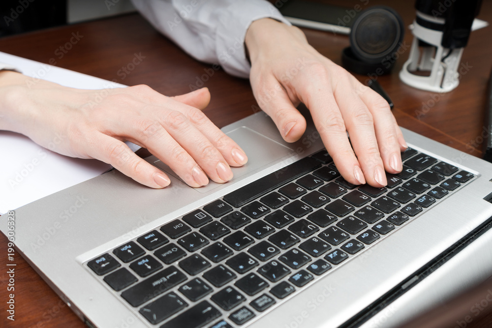 Closeup of a female hands busy typing on laptop. Copy space. Closeup of a female hands busy typing on laptop. Copy space.