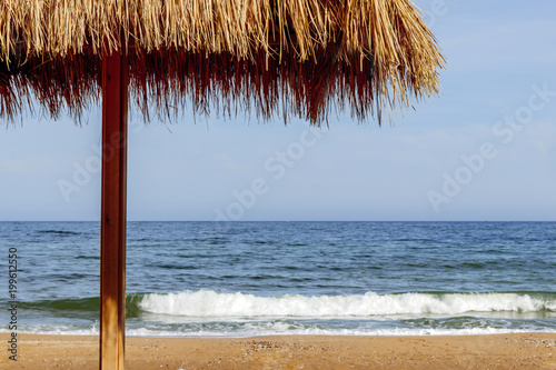 canopy from the Sun on the beach by the sea