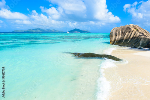 Source d'Argent Beach at island La Digue, Seychelles - Beautifully shaped granite boulders and rock formation - Paradise beach and tropical destination for vacation photo