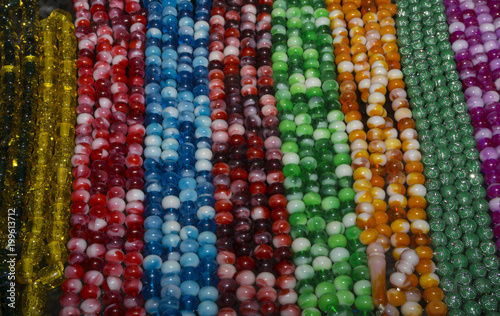 colorful glass beads on the souvenir shop shelf