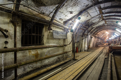 Fototapeta Naklejka Na Ścianę i Meble -  Underground coal ore mine shaft tunnel gallery with light
