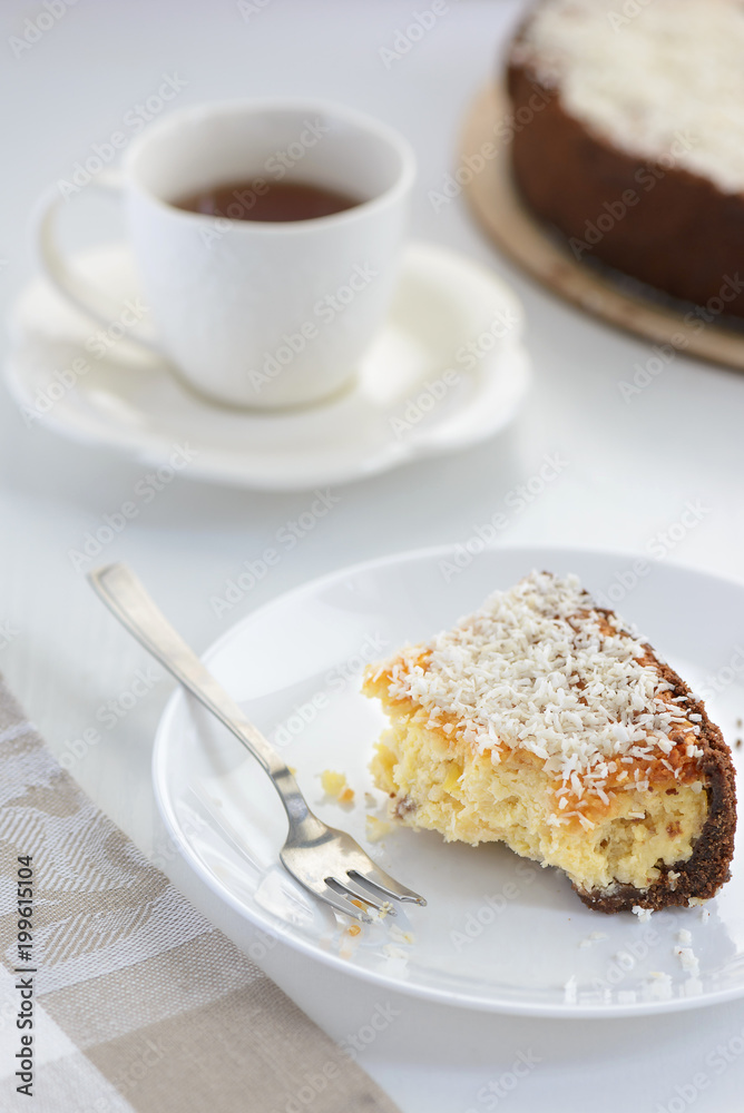coconut cheesecake with a cup of tea coconut cheesecake with a cup of tea