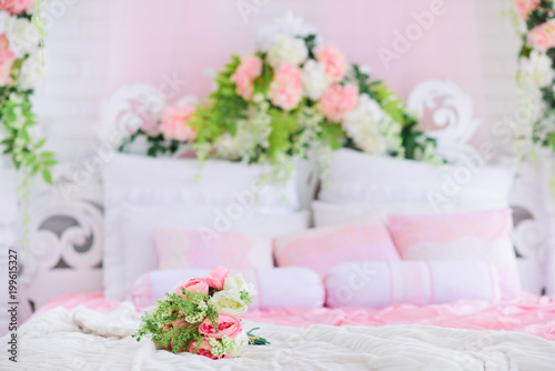 tender bouquet on the bed