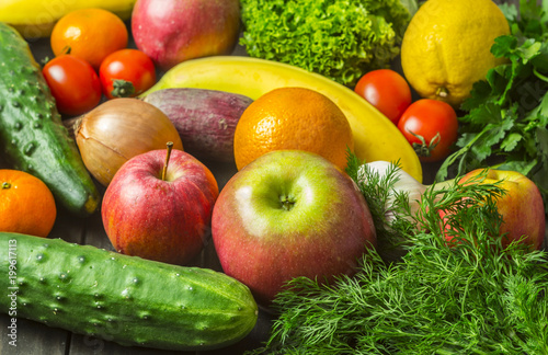 Assorted different fruits and vegetables as background. Healthy eating. Vegetarian food.